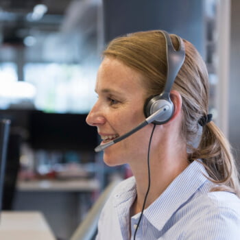 Woman offering help desk support