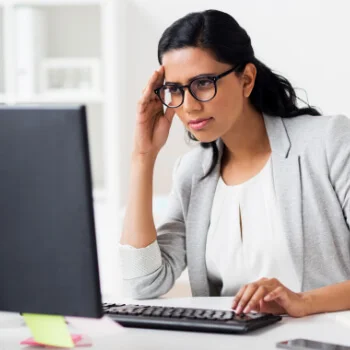Woman stressed about computer problems 
