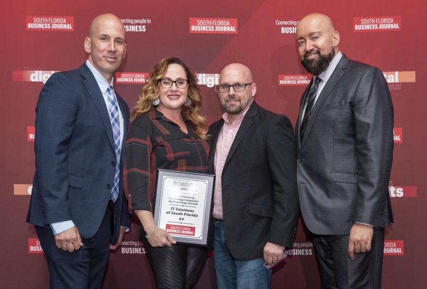 Deana and Jason Pizzo with award