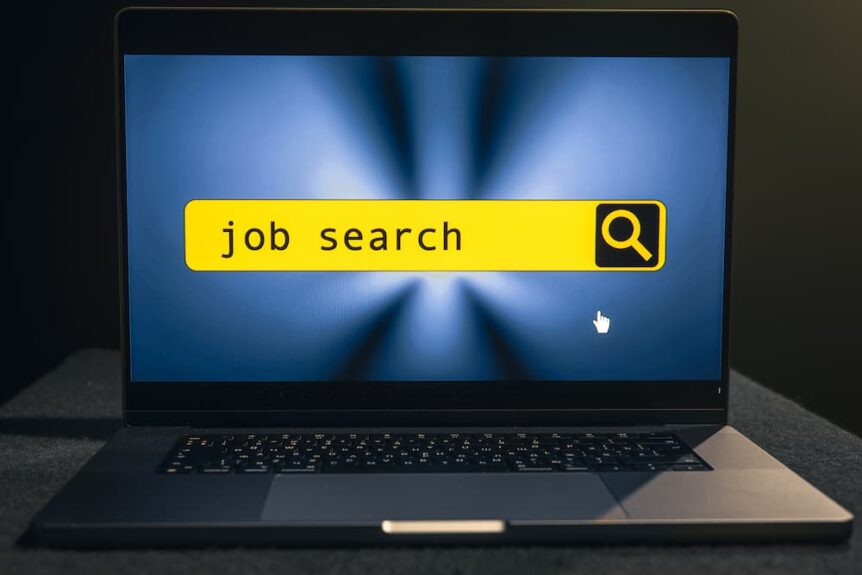 A laptop with a search bar that has "job search" written in it.